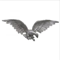 This 19" x 5 1/2" ornamental aluminum casting of an eagle with spread wings is made with steel weld tabs for installation.